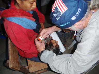 Frank uses MUAC bracelet on starving child